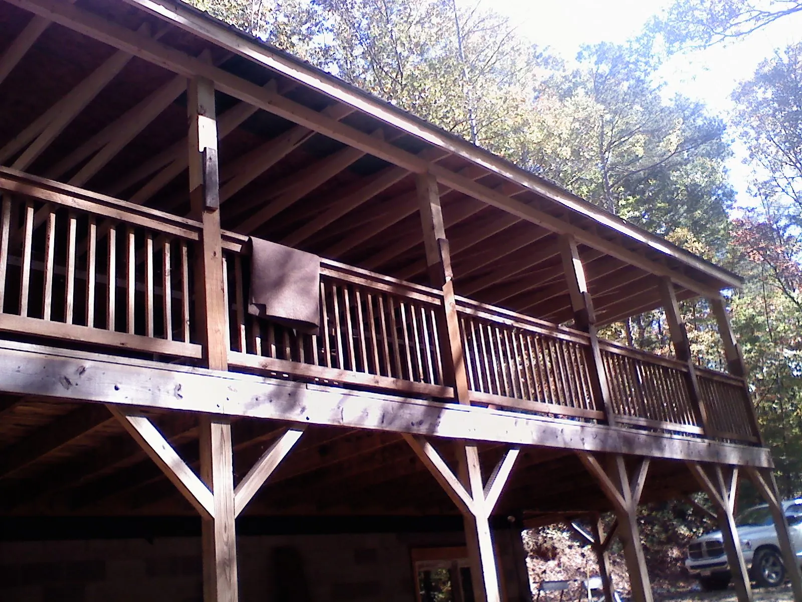 Timber framing under a new elevated porch and deck — Roof Leak Repair in Spirit Lake by Roofing Brothers